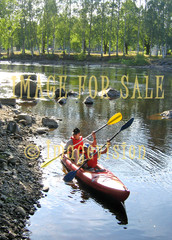 for sale paddlers in canoe on river in joensuu
