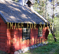 for sale old red house in sunlight
