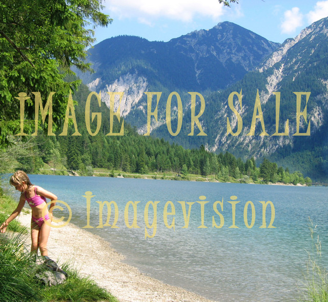 for sale beautiful mountain lake and child on beach