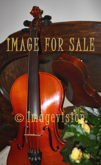 for sale violin on antique chest of drawers