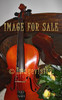 for sale violin on antique chest of drawers