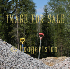 for sale two shovels and stone material