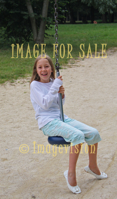 for sale girl laughing in swing