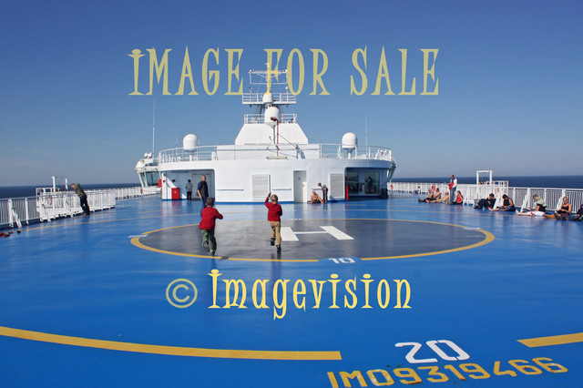 for sale passengers relaxing on helicopter deck