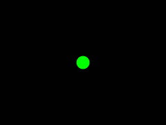 Vihreä ympyrä mustaa taustaa vasten/A green circle on a black background