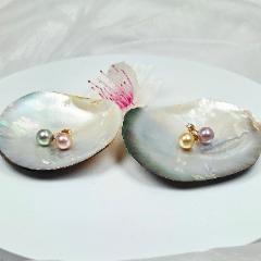 Uniikit duo-korvakorut etel&auml;meren/tahitin/makeanveden helmi